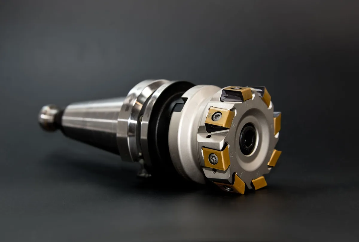 Indexable face-milling cutter on a dark background